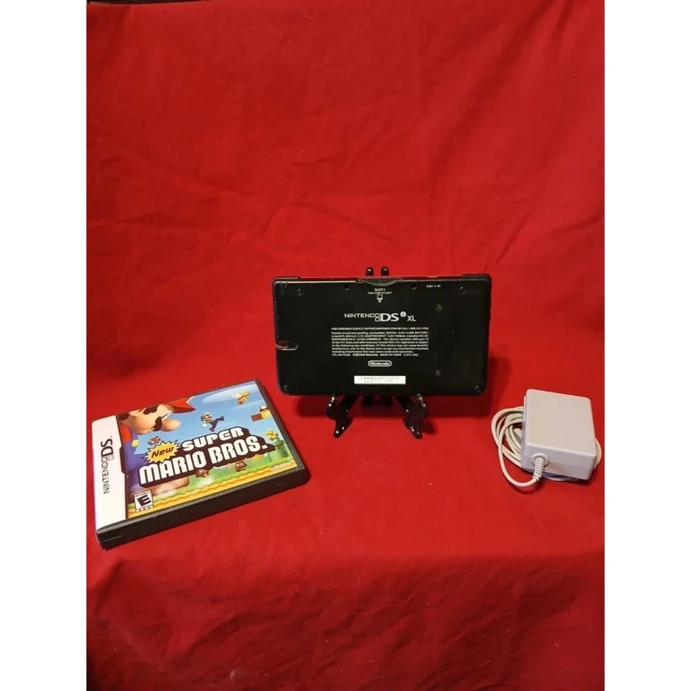 Red Nintendo DSi XL 25th Anniversary Edition Bundle With Super Mario Bros!